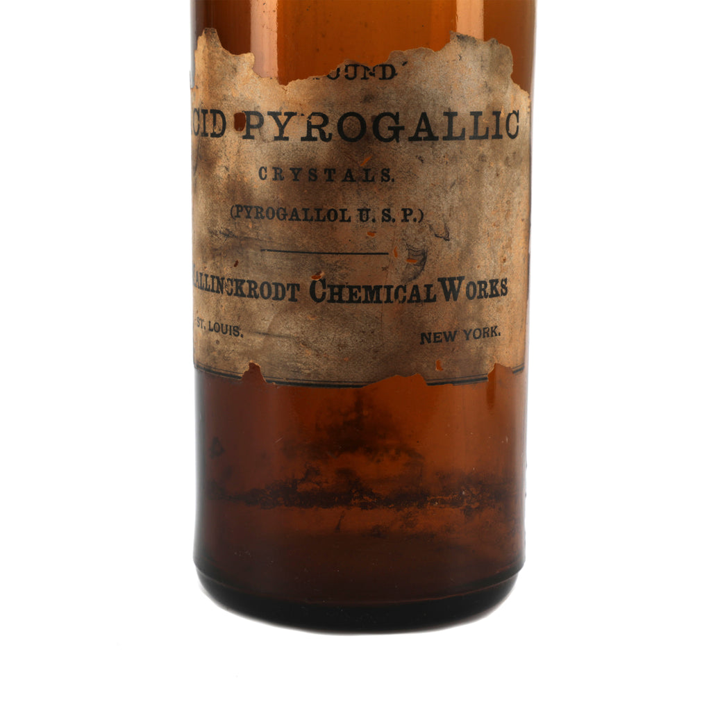 Brown Glass Chemical Bottle w/ Worn Label (A+D)