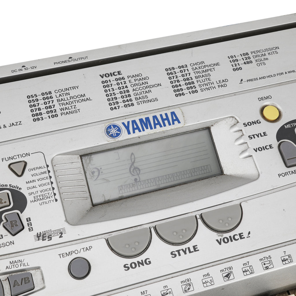 Silver Yamaha Keyboard w/ Blue Speakers