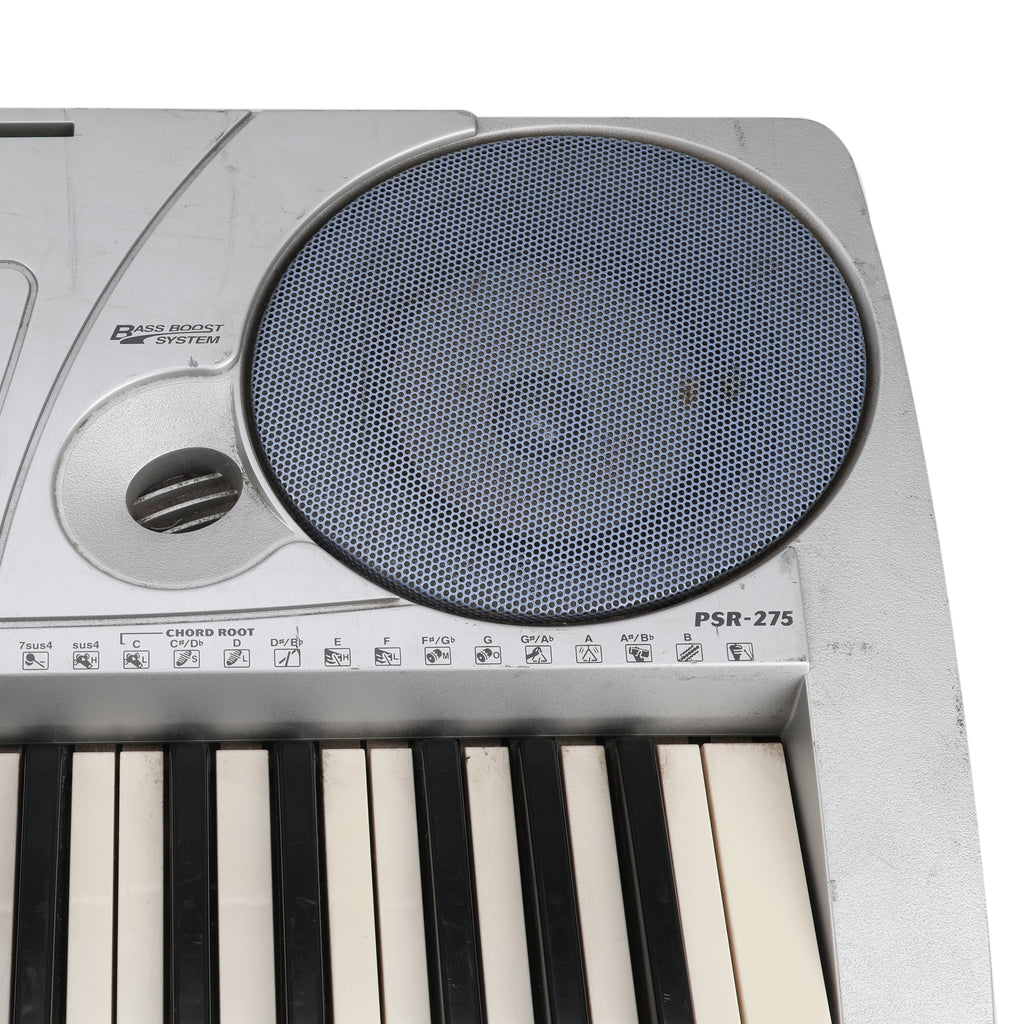 Silver Yamaha Keyboard w/ Blue Speakers