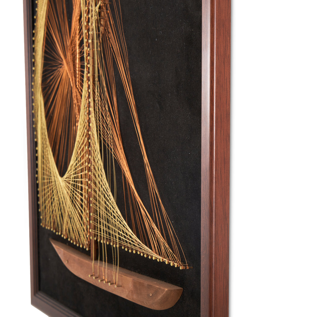 String Sailboat on Black Felt