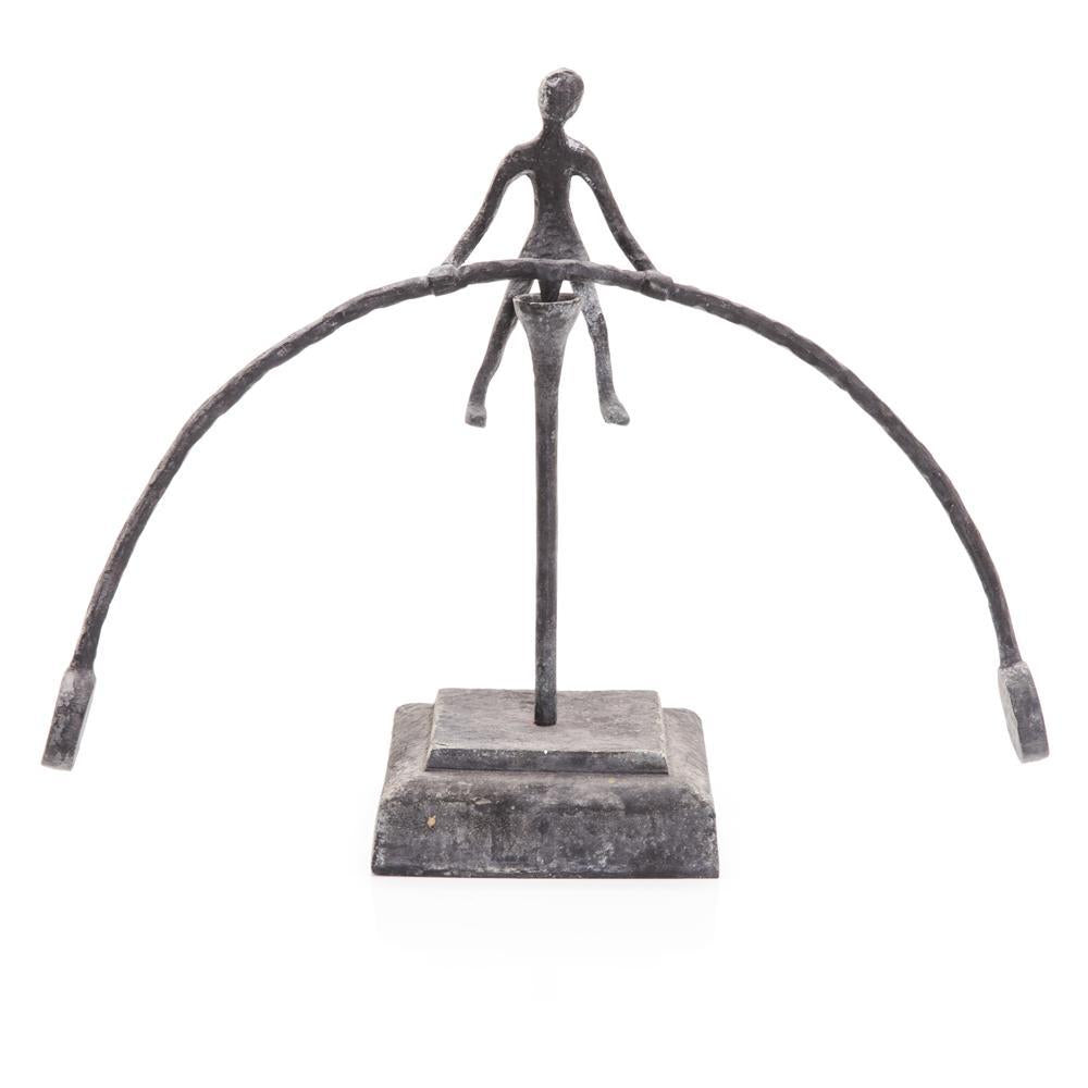 Black Metal Balancing Person Sculpture (A+D)