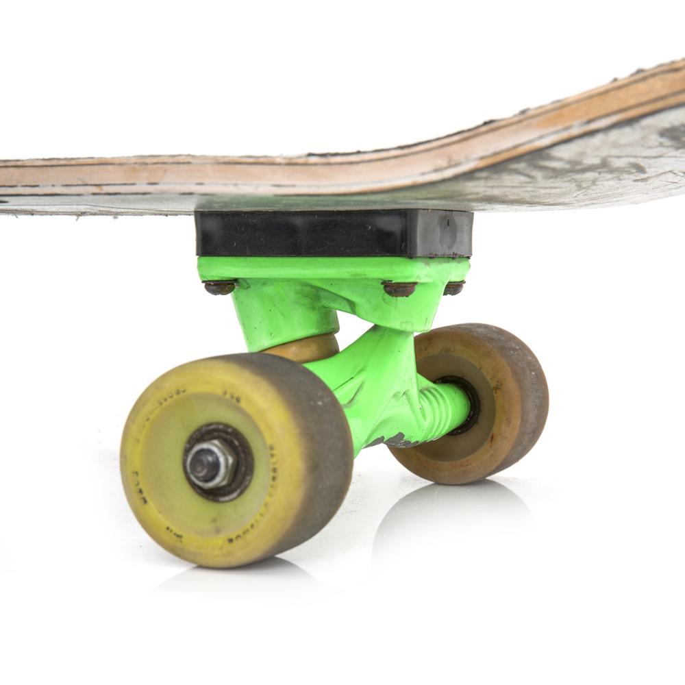 Messy Metal Skateboard with Green Trucks, Red & Yellow Wheels
