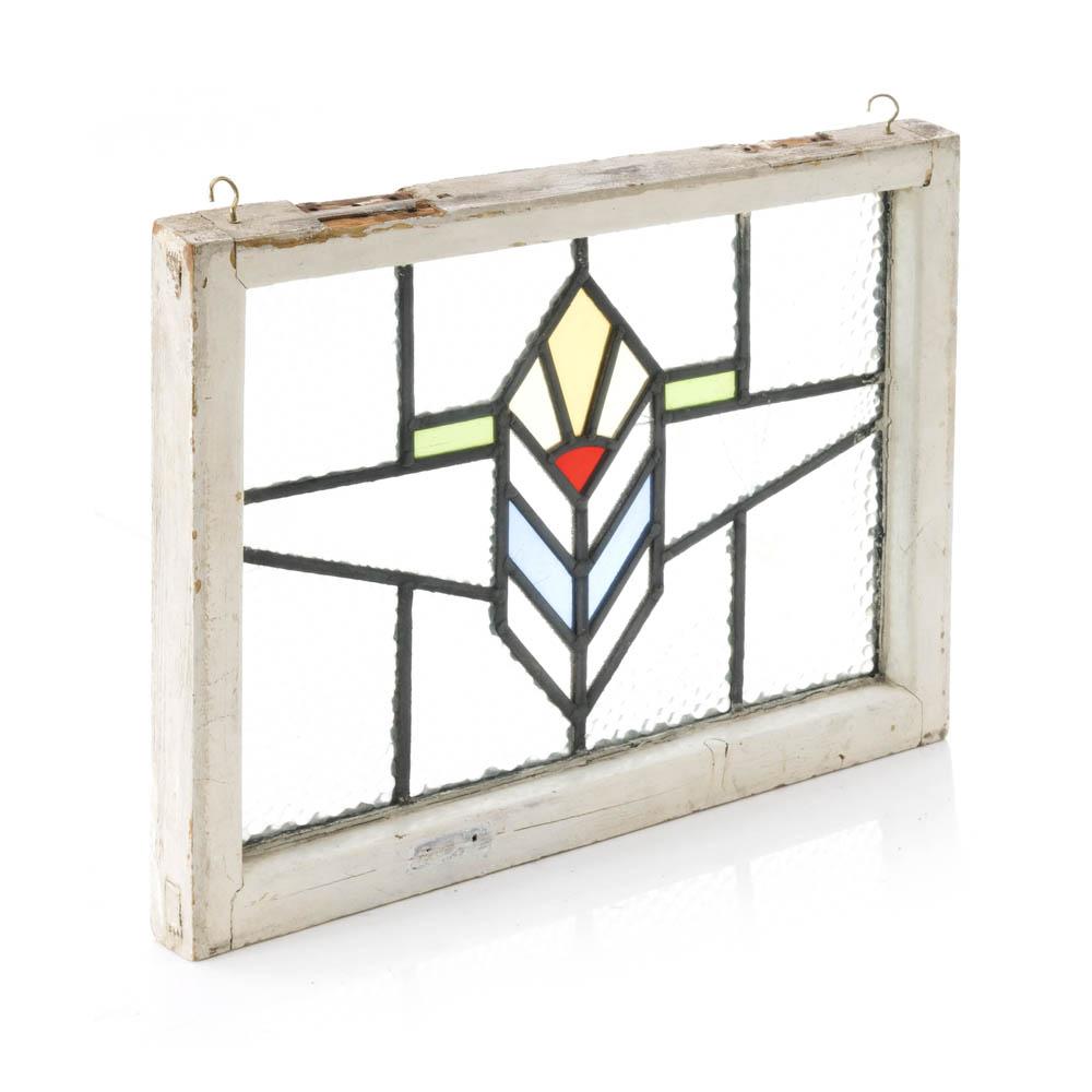 Geometric Stained Glass in Window Frame