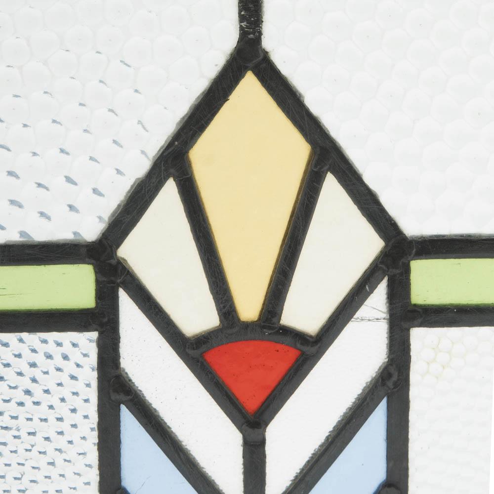 Geometric Stained Glass in Window Frame