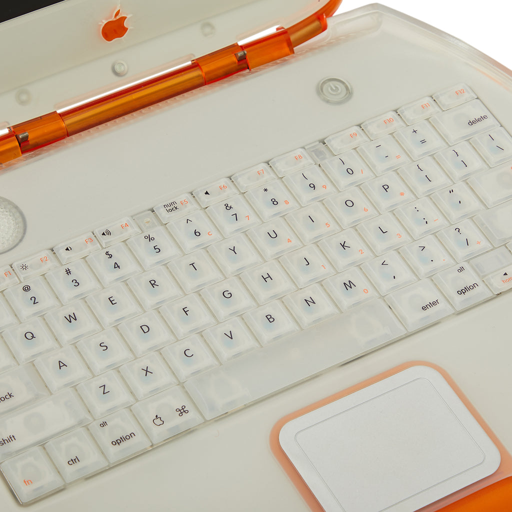 Orange Apple iBook Laptop