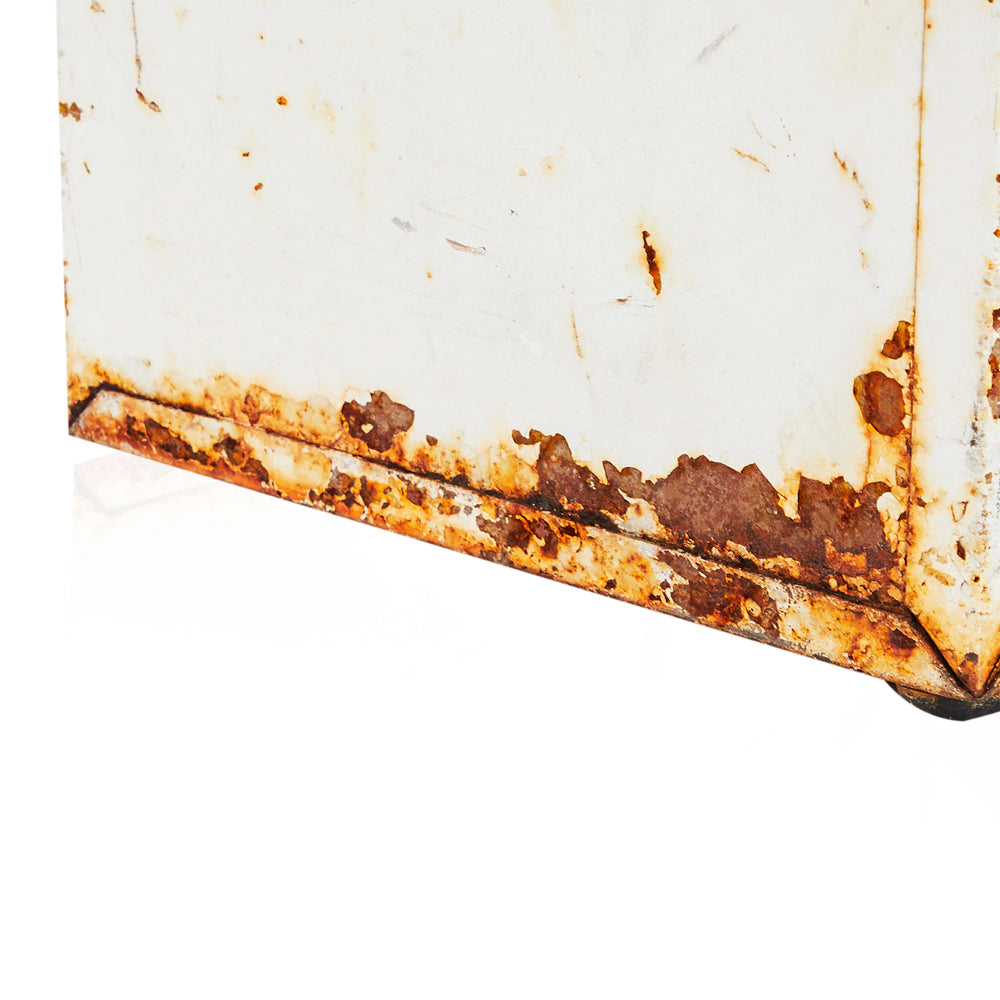 White Rusted Metal Garbage Can