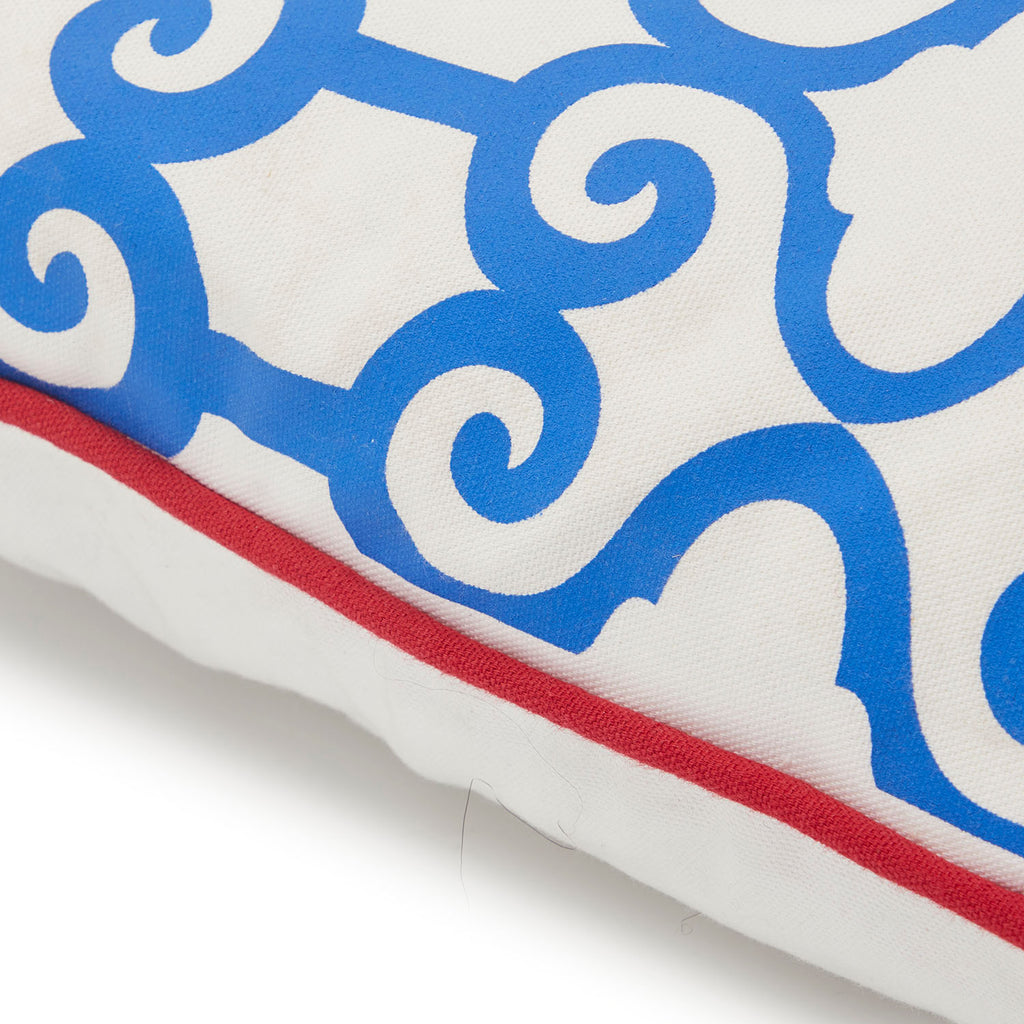 Blue Pattern on White Pillow with Red Trim