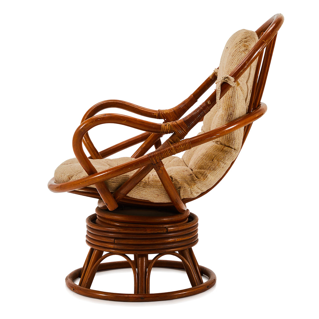 Brown Rattan Swivel Arm Chair