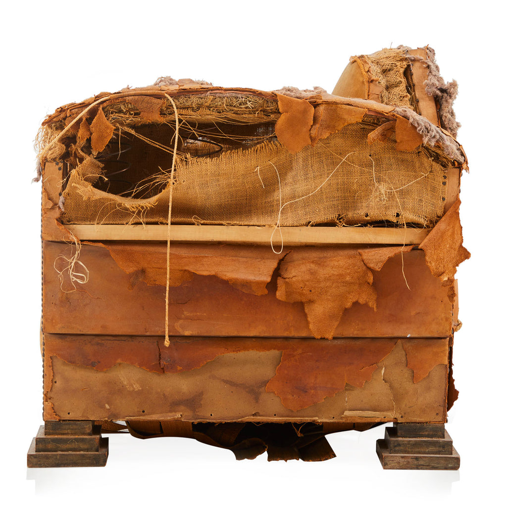 Heavily Distressed Brown Armchair