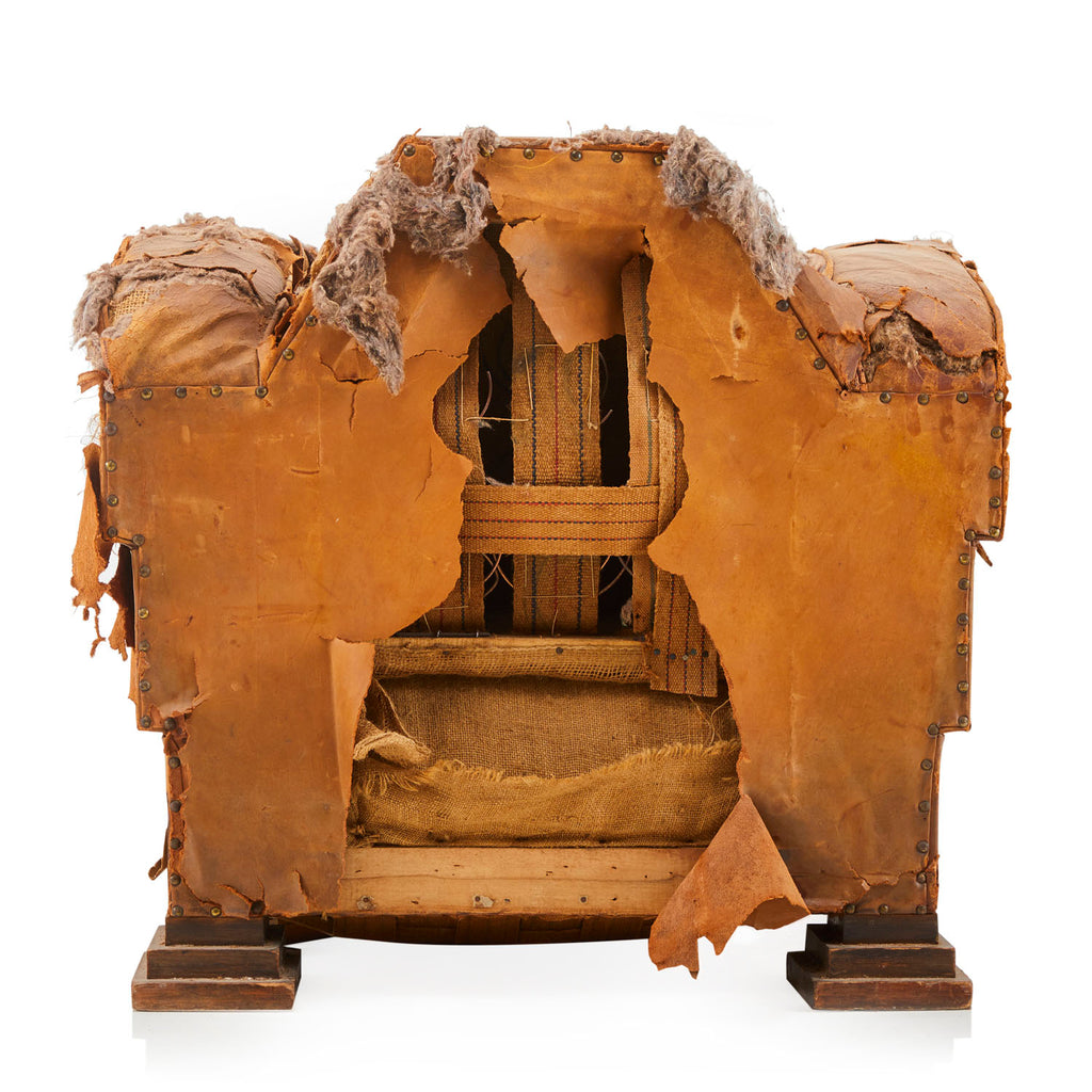 Heavily Distressed Brown Armchair