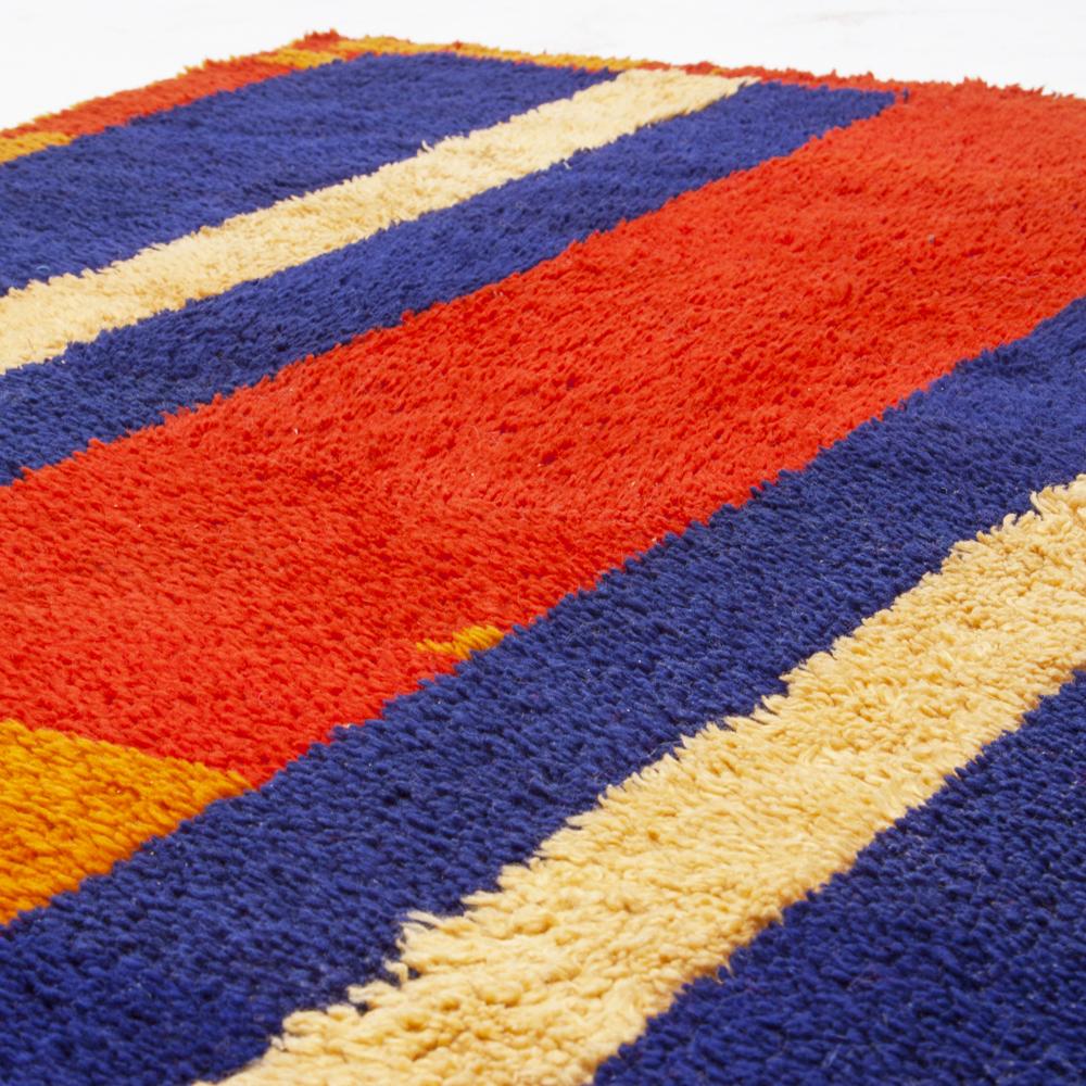 Red, Yellow, Blue Striped Rug