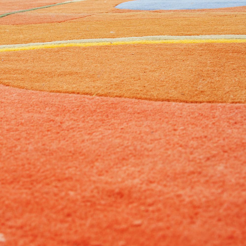 Orange Rug with Colored Swirls