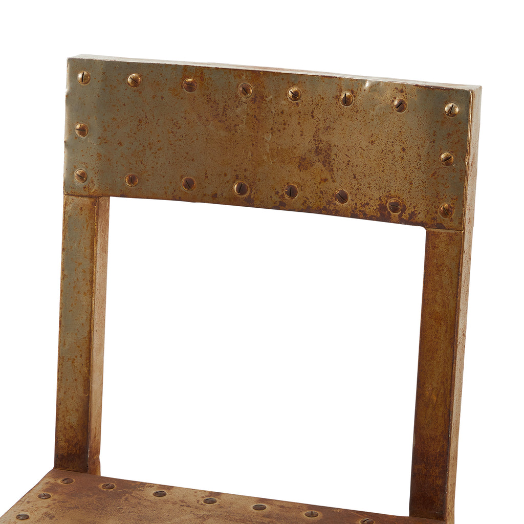 Rust Metal Rivet Chair
