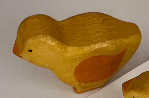 Small yellow wooden chicks
