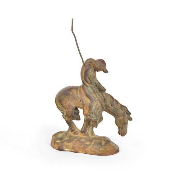 Brown Metal Wounded Man Sculpture